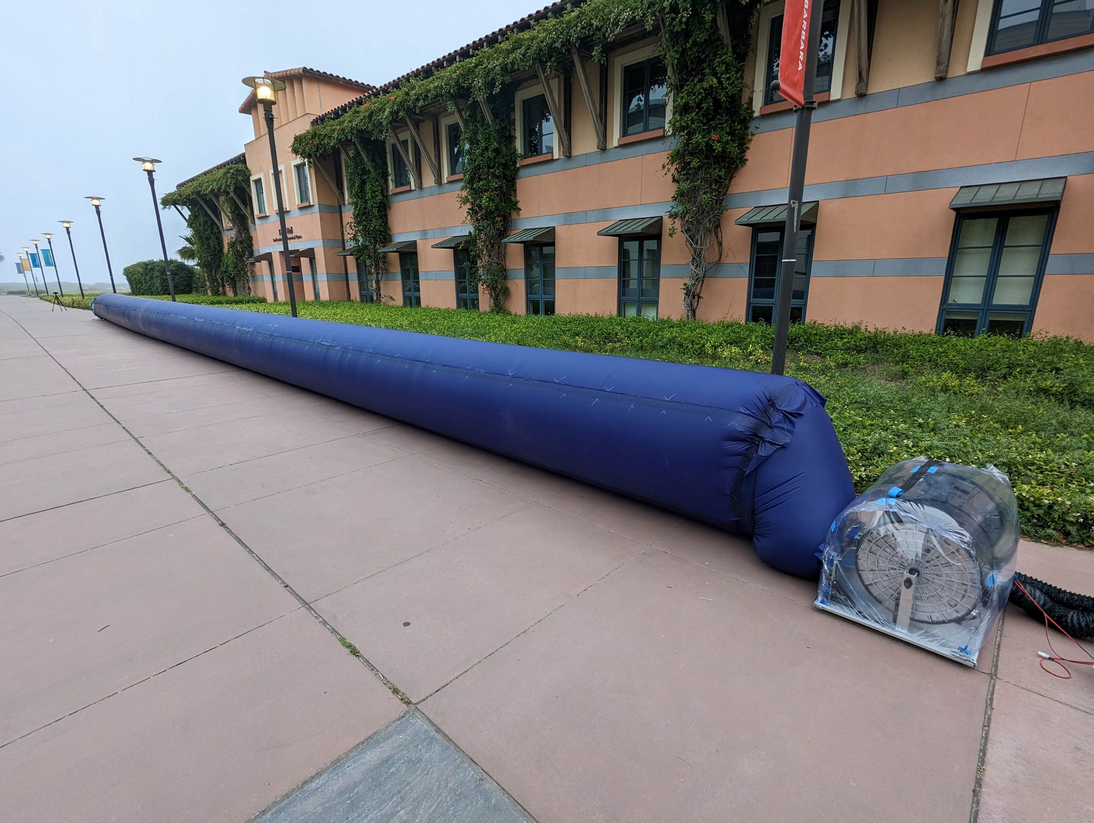 Image of the vine robot extended from the base station at UCSB.